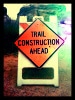 Construction bonds - The image shows a sign warning about construction.