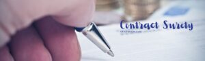 Contract Surety - This banner shows a person signing a contract in a table.