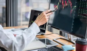 Man looking at a screen in Alaska about bonds