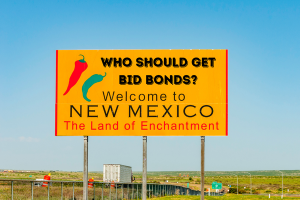 New Mexico welcome sign with a question about bid bonds, representing who should get bid bonds in the state, a vital part of the construction bidding process.