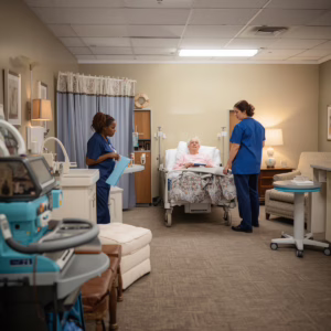 Medical caregivers supporting senior patient during home healthcare visit for Arkansas Home Health Agency Bond licensing
