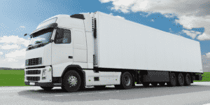 Freight Broker - The image shows a white wheeler trcuk in a road with a sunny sky as backhground.