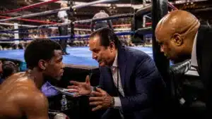 Florida Boxing Promoter giving final instructions to a professional boxer before a licensed boxing event in Florida.