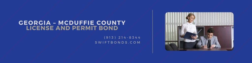 GA – McDuffie County – License and Permit Bond - A contractor is signing a document for their contract with the surety agent beside him.