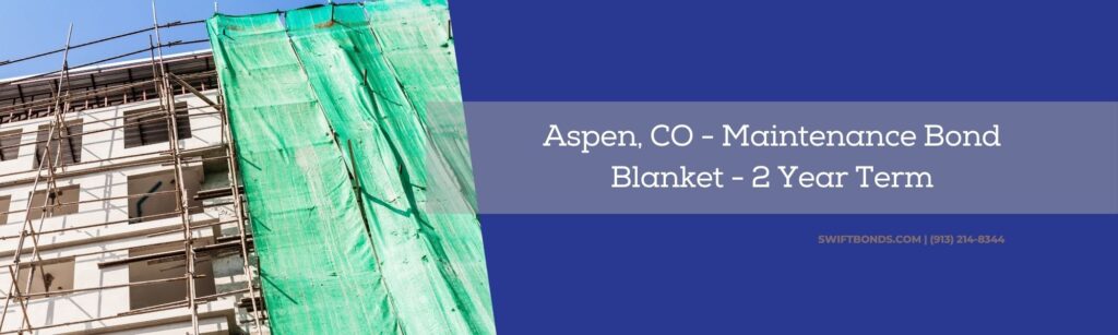 Aspen, CO – Maintenance Bond – Blanket – 2 Year Term - A small apartment of office building undergoing renovation with scaffolding and green net.