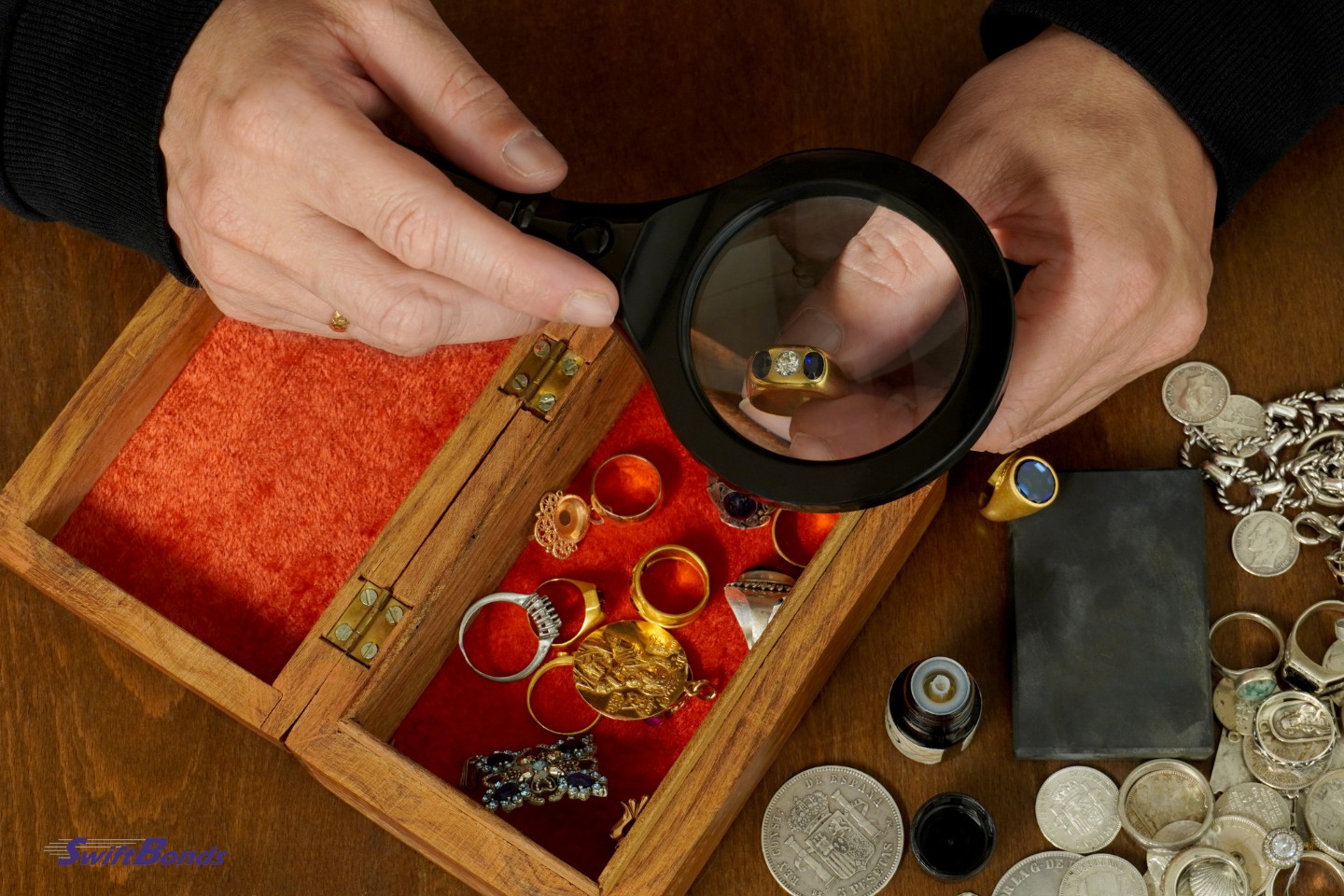 through a magnifying glass to the jeweler.