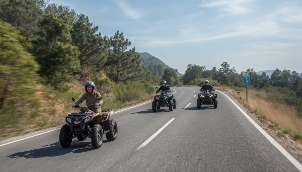 Street-legal quadricycles traveling on a scenic Montana roadway, highlighting licensed motorcycle and quadricycle dealership operations.