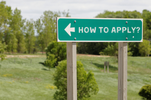 Green road sign labeled 'How to Apply?' illustrating the steps to apply for license and permit bonds in Wisconsin.