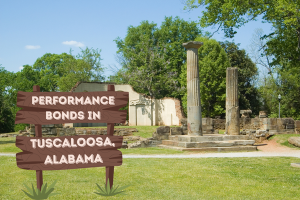 Ancient ruins in Tuscaloosa, Alabama, with a wooden sign that reads 'Performance Bonds in Tuscaloosa, Alabama' highlighting the importance of securing bonds for construction projects.