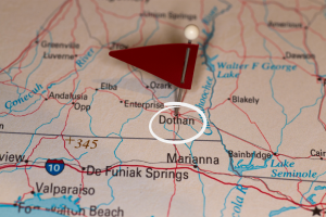 Close-up of a map highlighting Dothan, Alabama with a red marker, showcasing the region's location and surrounding areas.