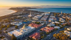 Aerial view of San Rafael, California, at sunset, featuring iconic landmarks, a sprawling coastal skyline, and charming residential areas. A vibrant community supported by secure construction practices.