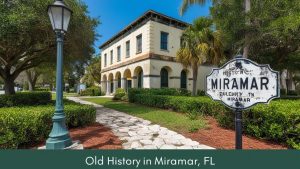 Historic landmark in Miramar, Florida surrounded by lush greenery and featuring an old-style building with a weathered sign marking the city’s rich heritage.