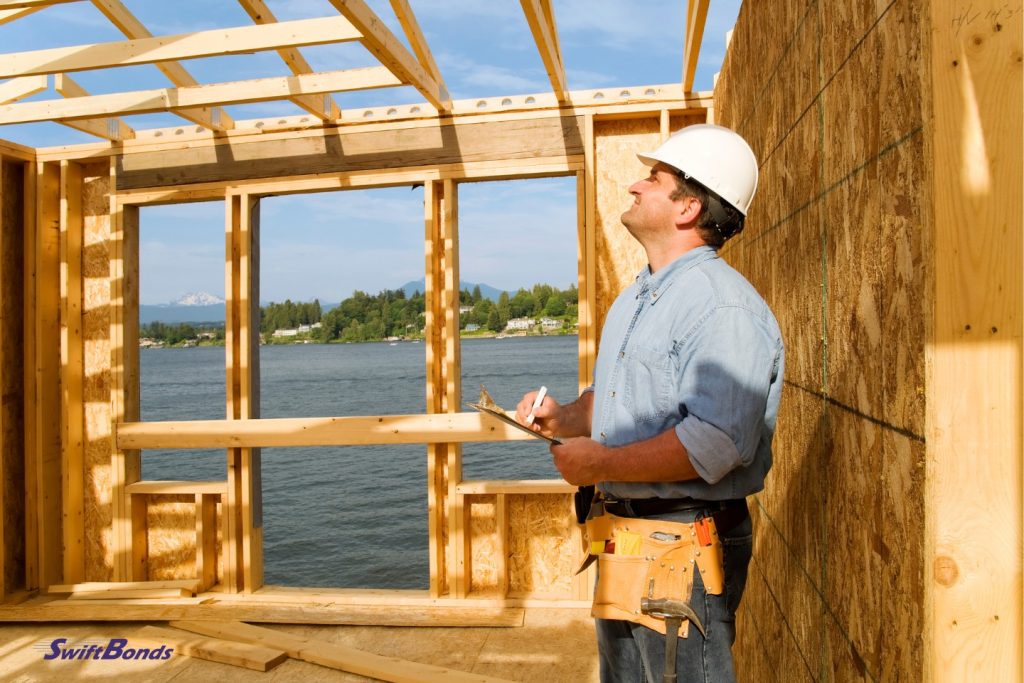 An image of a construction worker examining an ongoing job.