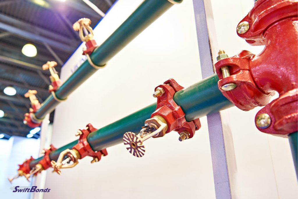 The exhibition's fire extinguishing systems have sprinkler heads.