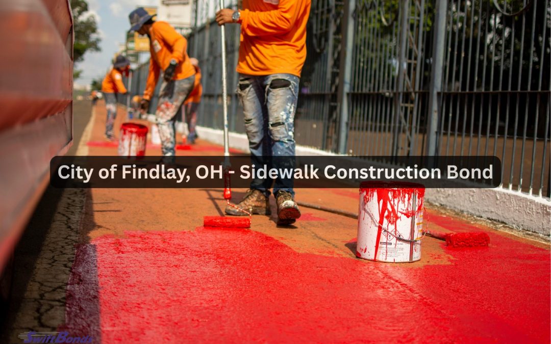 The freshly built walkway is being painted by the contractor.