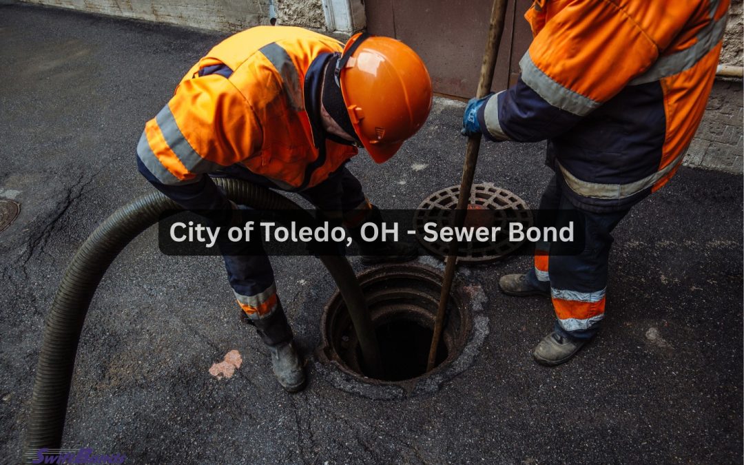 Sewer workers clear the sidewalk and street of obstructions and clean manholes.
