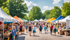 Busy outdoor farmers market with colorful tents and families shopping in Germantown, Tennessee on a sunny day