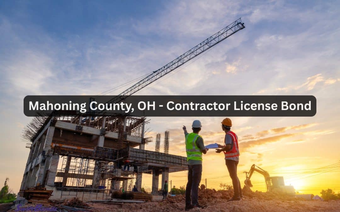 An engineer and a worker are examining the project at the construction site.