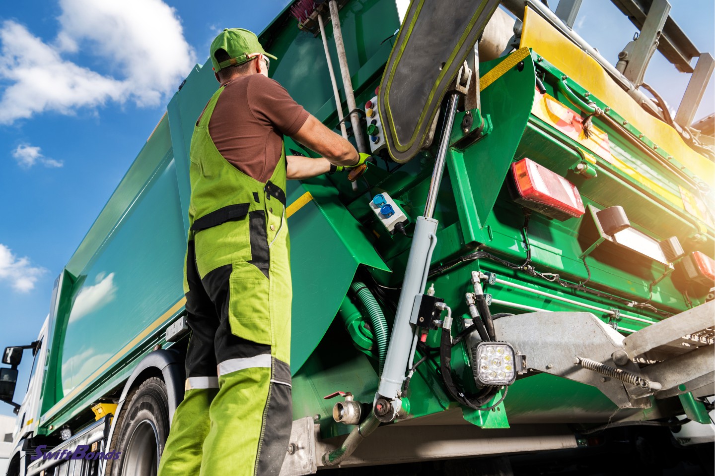A modern garbage truck with a man collecting waste.