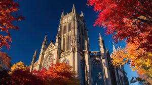 Gothic architecture of Heinz Memorial Chapel framed by vibrant autumn leaves in Pittsburgh, Pennsylvania, representing the city’s historic charm and structural craftsmanship.