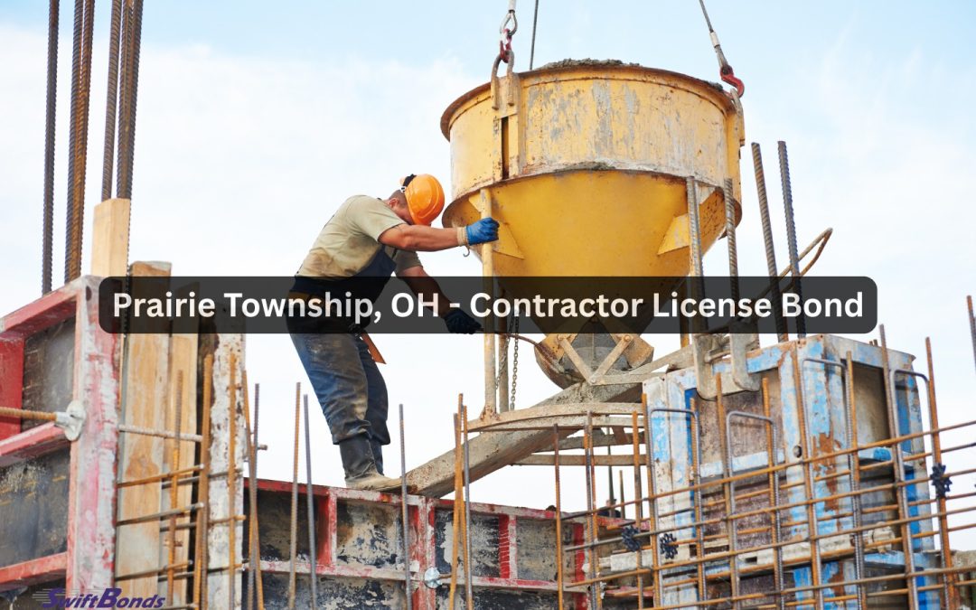 Concrete is poured by construction workers for the building's foundation.