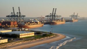 Container cargo ships docked at the Port of Texas City, Texas – a key site for public construction projects requiring performance bonds

