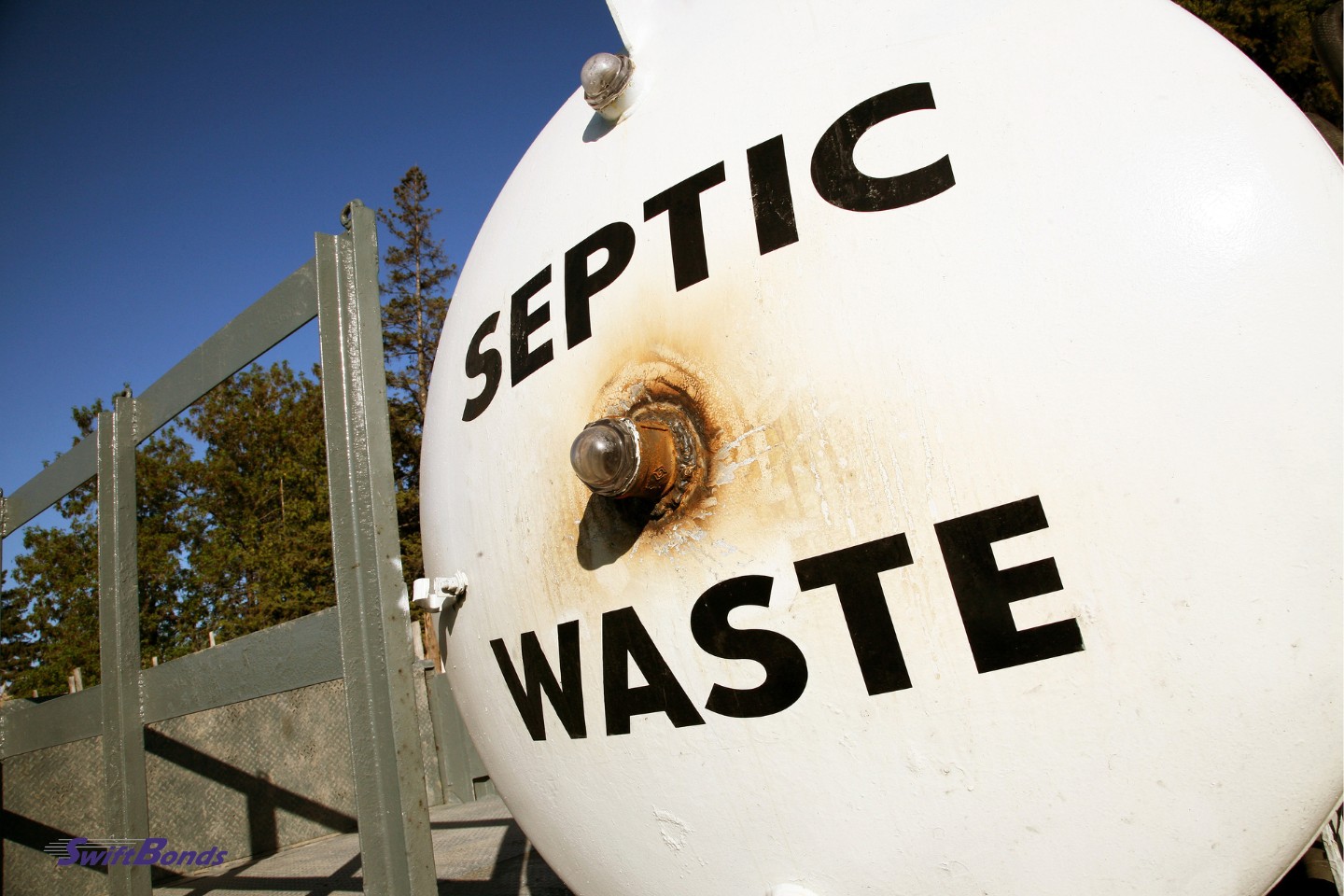 Black and white septic waste storage.