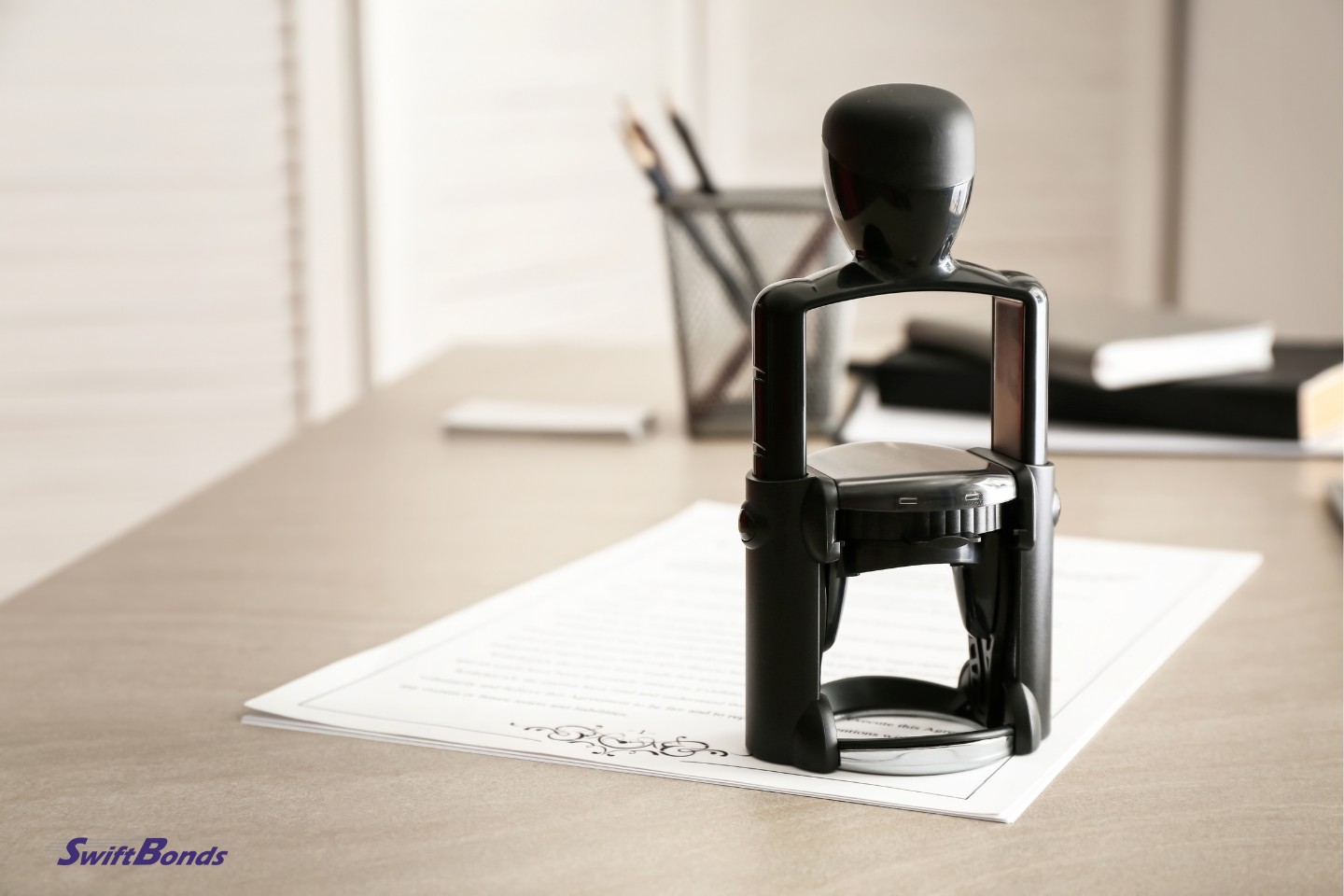 The document and stamp are on the notary public's table.