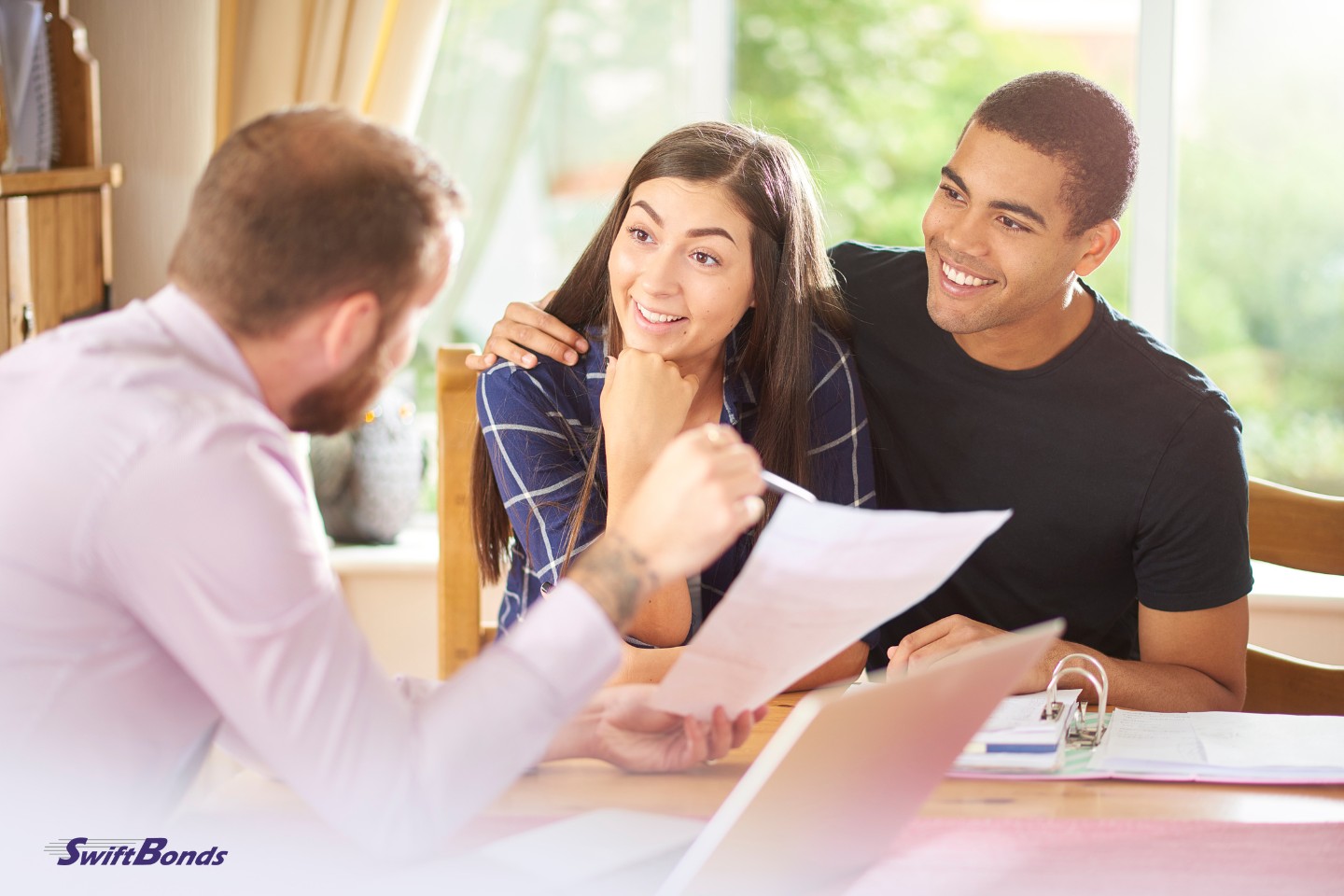 The mortgage broker and a client.