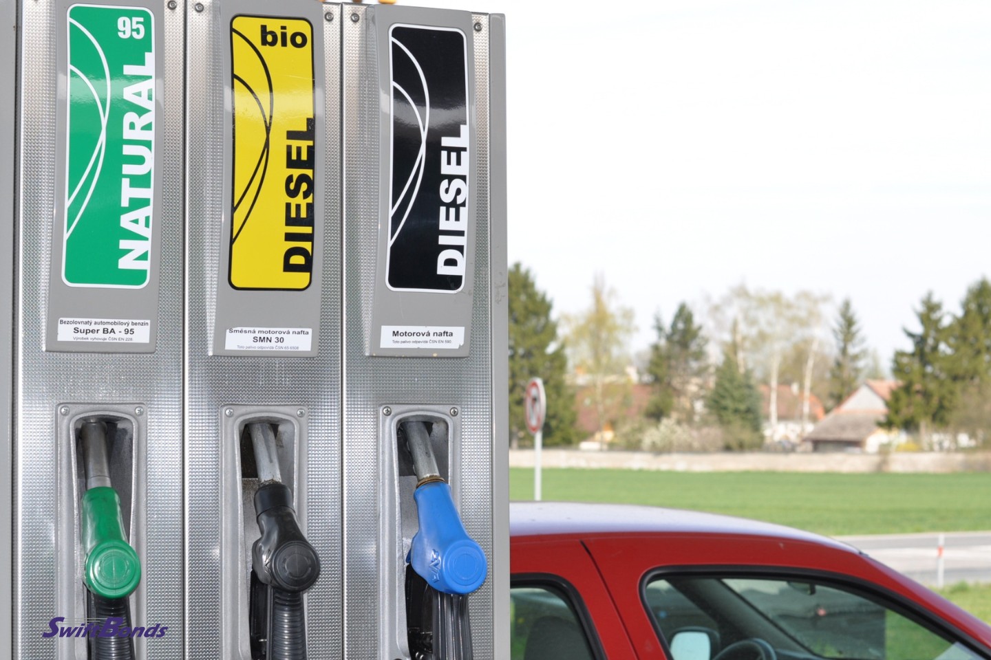 The gas station has a fuel pump that runs on both natural and diesel.