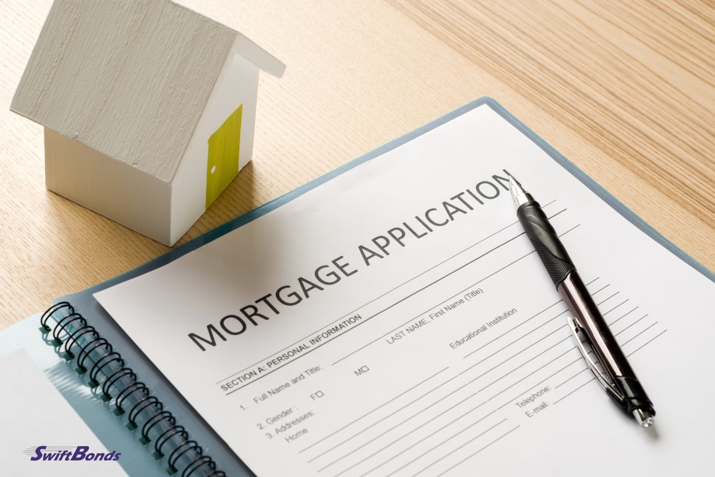 On the table is a mortgage document.