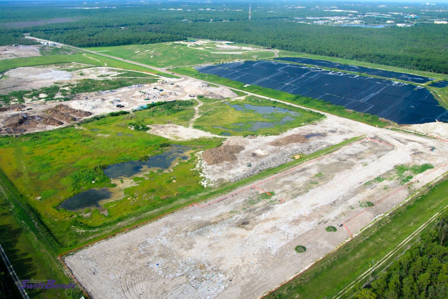 A helicopter photo of a landfill.