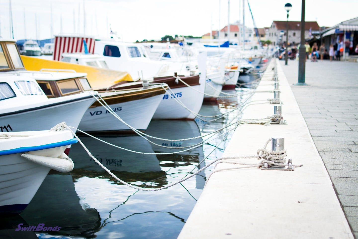 Boats are waiting at the sea dock.