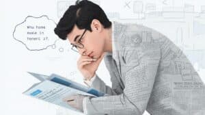 Man reading a compliance document titled ‘What Is a Fuel Tax Bond,’ thoughtfully analyzing fuel tax regulations and bonding requirements.