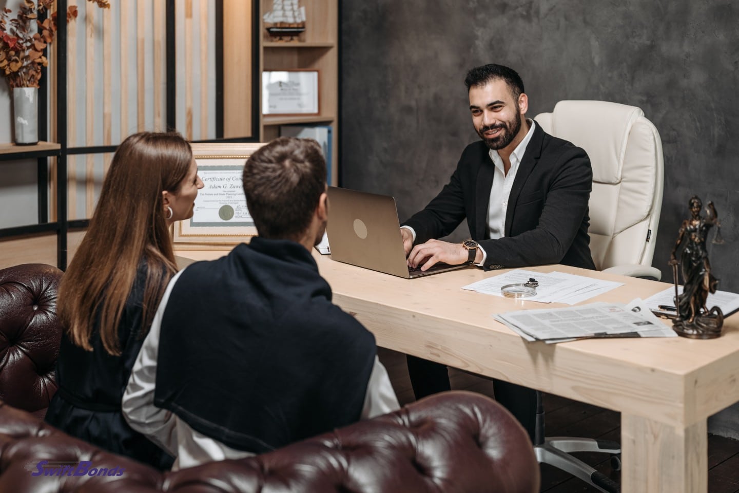 A lawyer discussing bonds or a business permit with the couple.