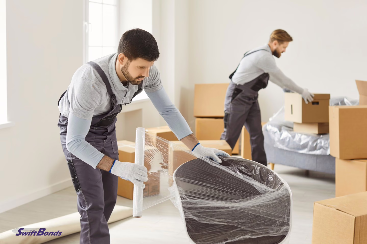 Furniture is packed by expert movers when a house is being moved.